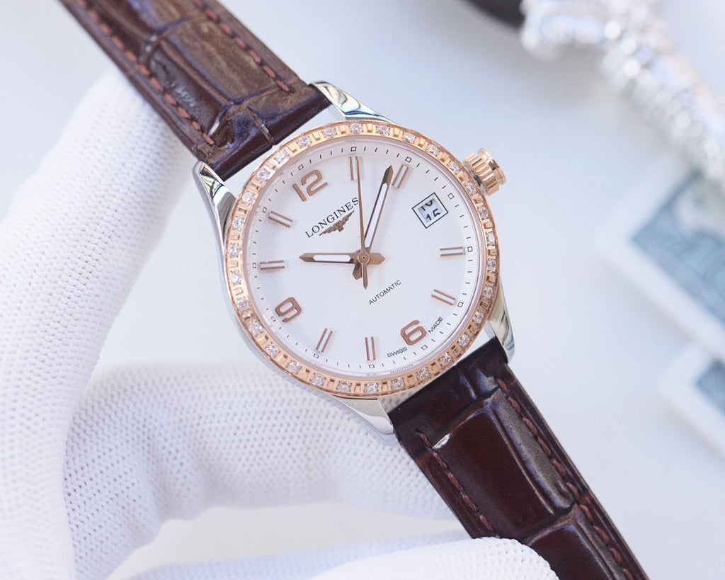 Longines dress wristwatch with white dial, rose-gold bezel, brown leather strap