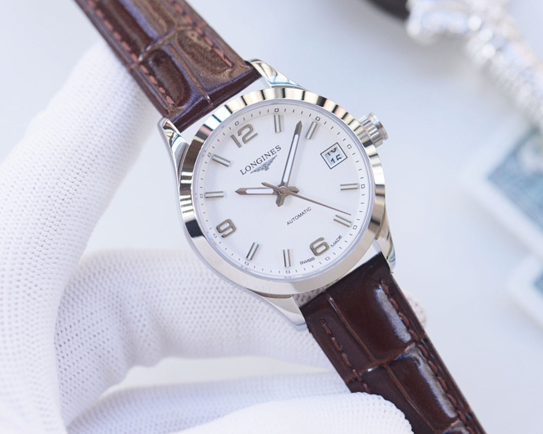 Longines wristwatch with white dial and brown leather strap, silver case and bezel