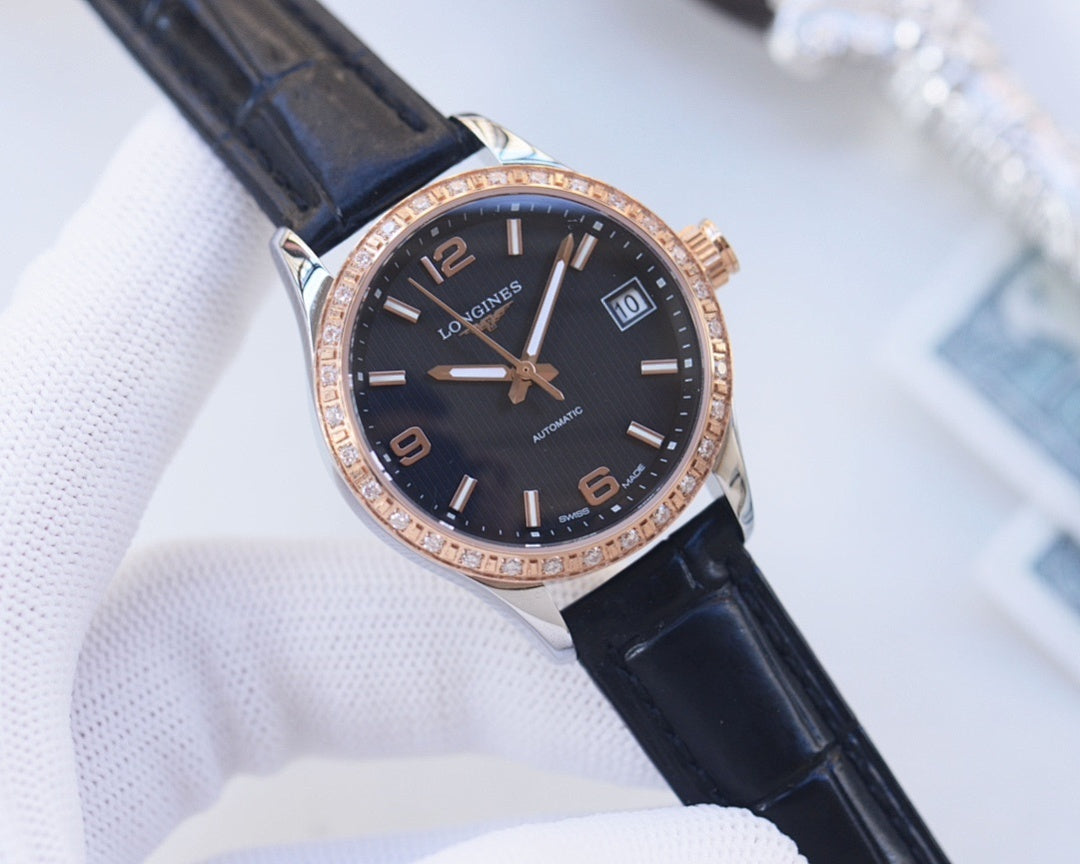 Longines dress wristwatch with black dial, rose-gold bezel, dark leather strap