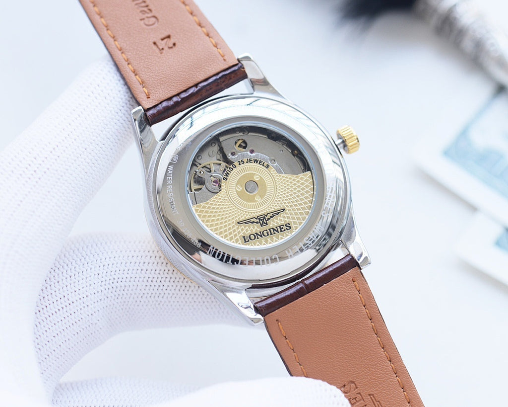 Longines wristwatch caseback with mechanical dial, tan leather strap