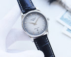 Longines wristwatch with white dial, silver case, blue leather strap