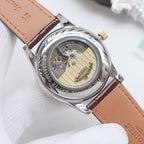 Longines watch caseback detail on brown leather strap, visible mechanical movement