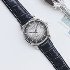 Longines watch, silver case, gray dial, dark blue leather strap, date at 3