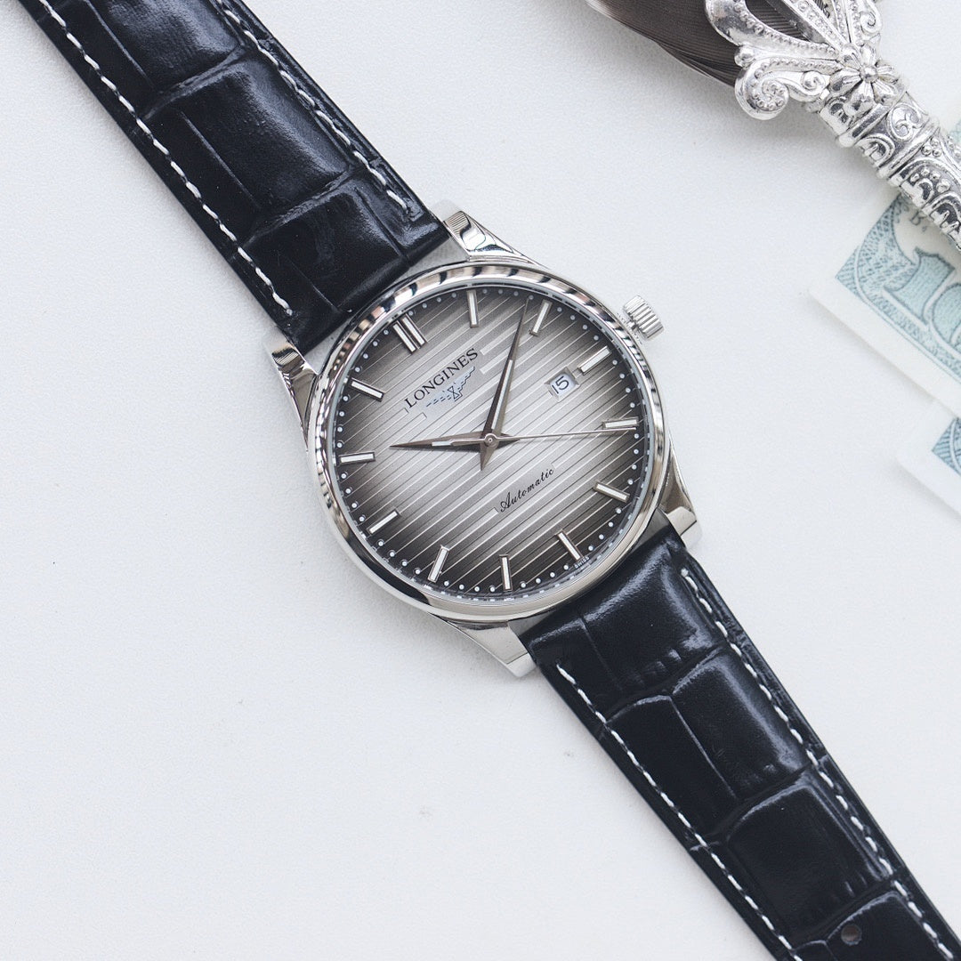 Longines watch, silver case, gray dial, dark blue leather strap, date at 3