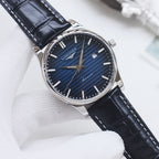 Longines watch, silver case, navy dial, dark blue leather strap, date window