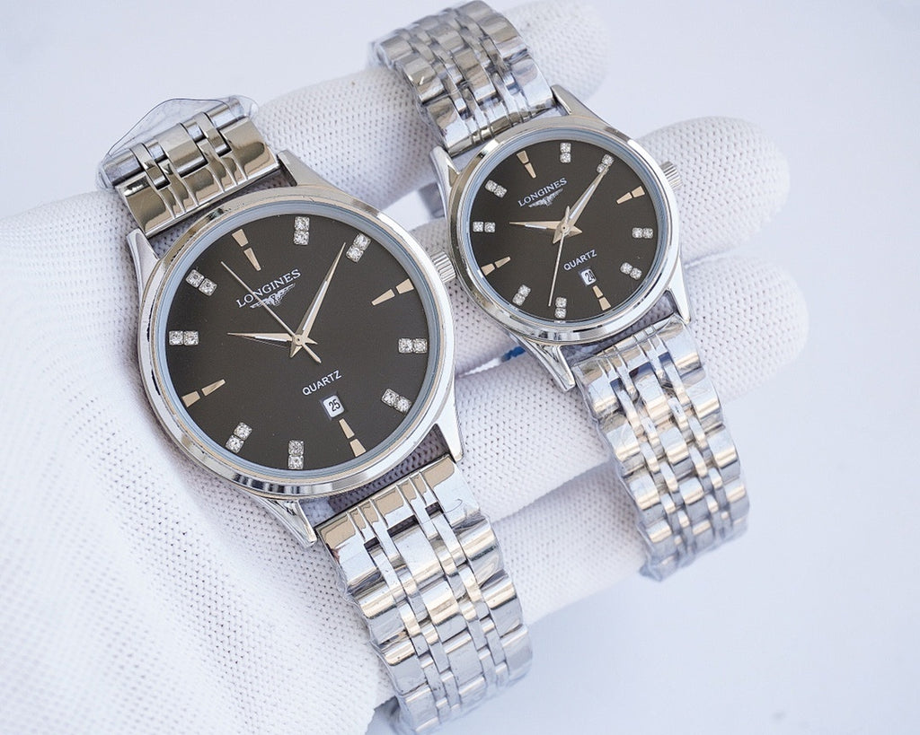 Quartz wristwatch set with dark dials and silver metal bracelets