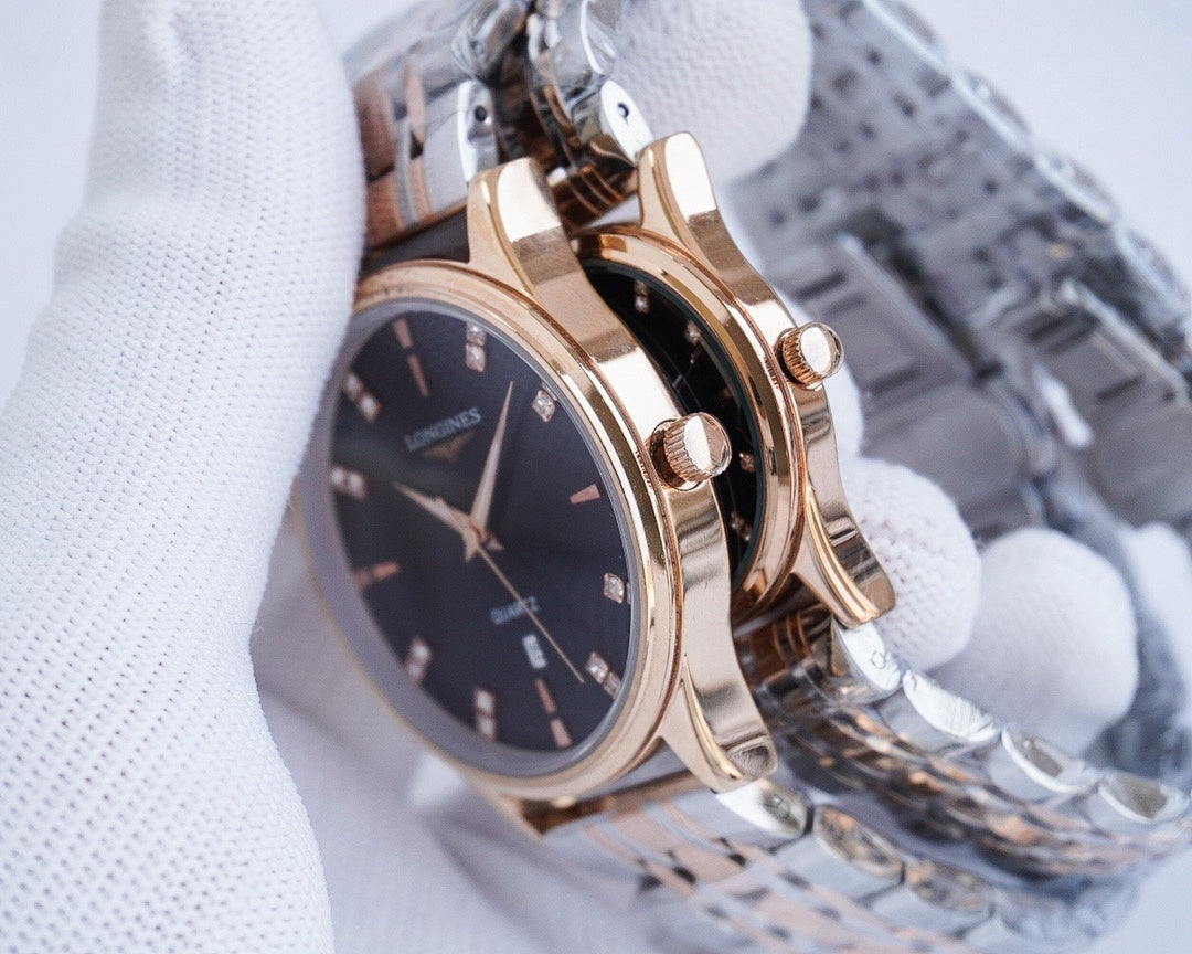 Two-tone rose-gold watch with dark dial and metal link bracelet