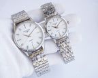 Quartz wristwatch set with white dials and silver metal bracelets