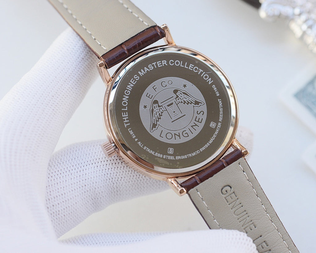Longines watch case back with brown leather strap and engraved collection text