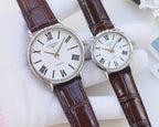 Longines wristwatches with brown leather straps and light dials, Roman numeral markers