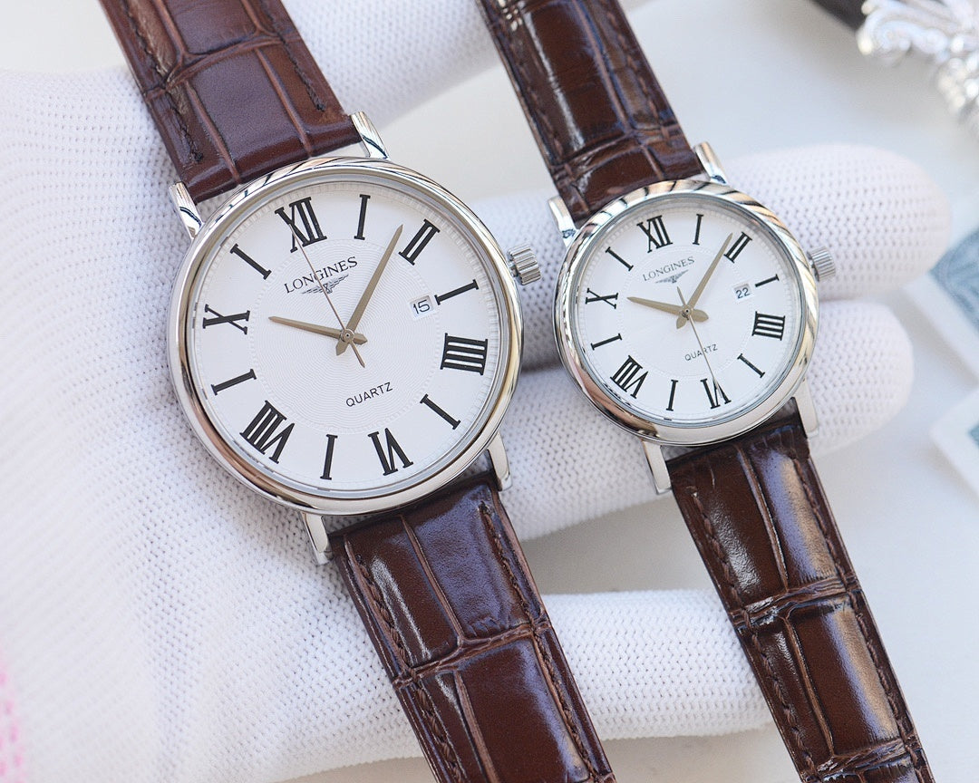 Longines wristwatches with brown leather straps and light dials, Roman numeral markers