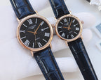Longines wristwatches with blue leather straps and dark dials, Roman numeral markers