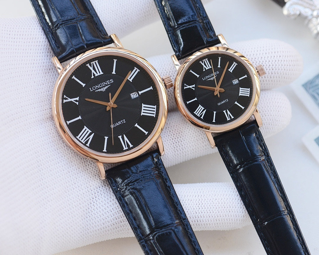 Longines wristwatches with blue leather straps and dark dials, Roman numeral markers