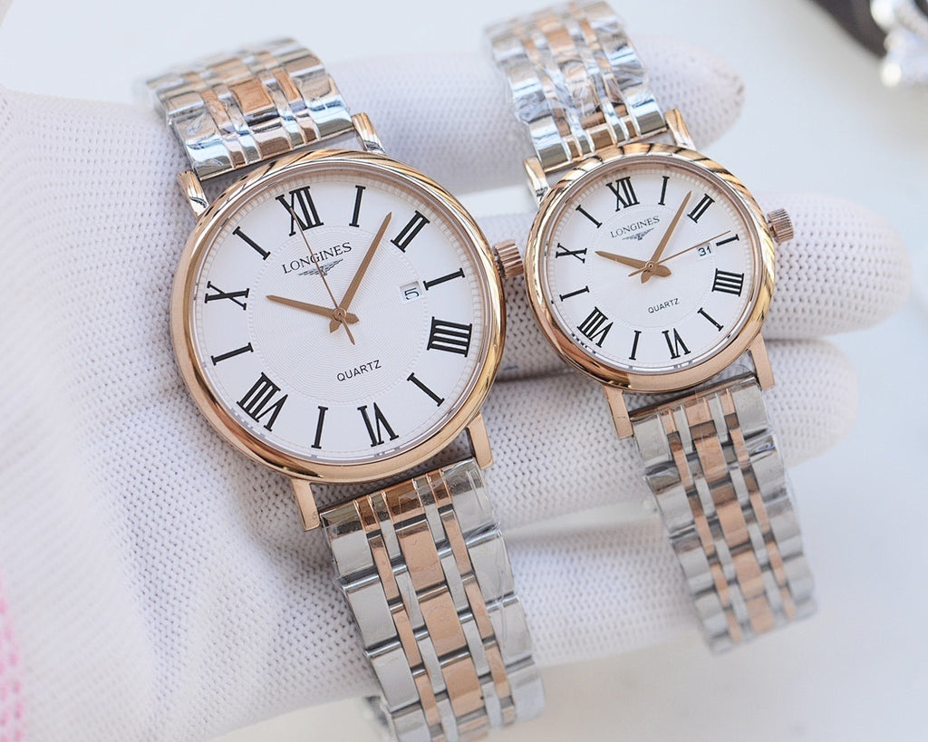 Longines wristwatches with rose-gold cases, silver metal bracelets, and white dials