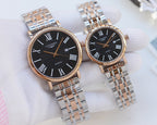 Longines wristwatches with rose-gold cases, silver metal bracelets, and dark dials