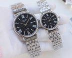 Longines wristwatches with silver metal bracelet and dark dial, Roman numeral markers