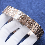 Longines stainless steel metal link bracelet, polished and textured in close view