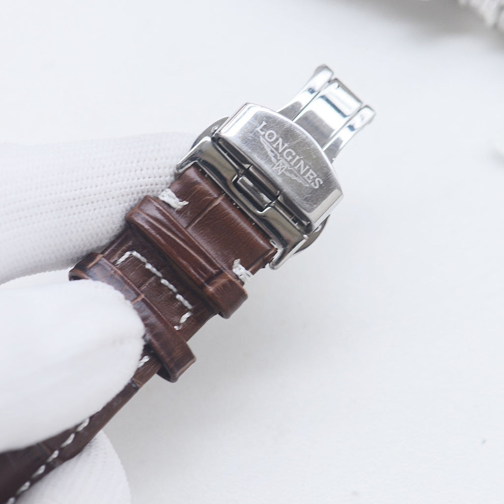 Longines watch brown leather strap with silver buckle and clasp