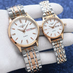 Longines two-tone quartz watch pair with white dials and metal bracelet straps