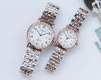 Pair of metal bracelet watches with white dials and rose-gold cases