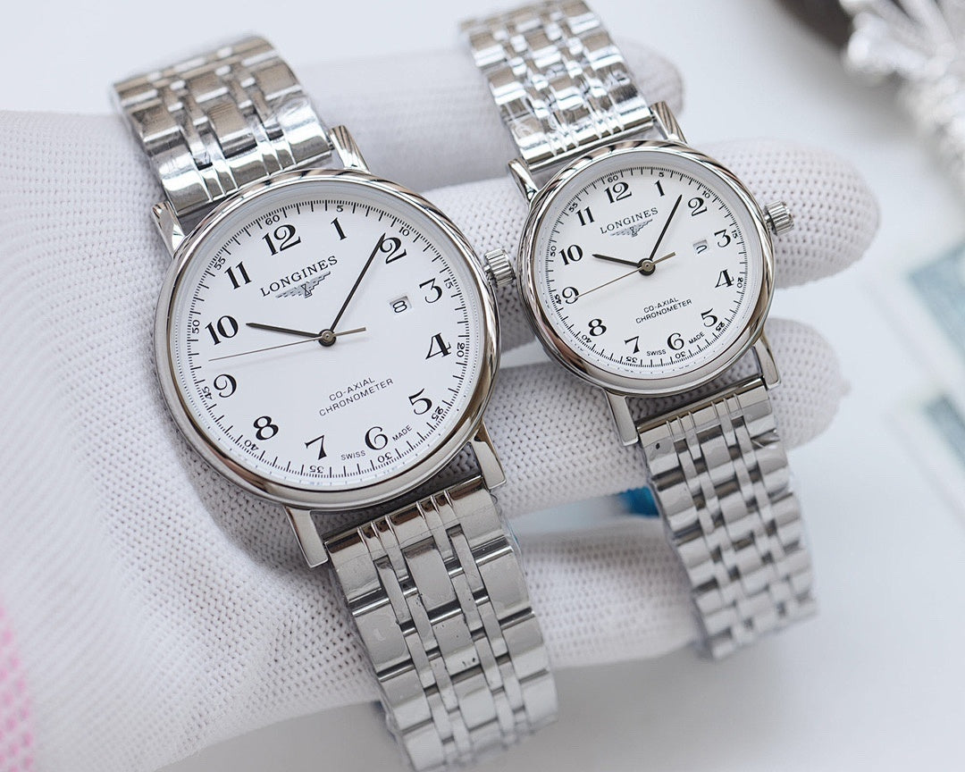Pair of stainless steel watches with white dials and metal bracelet straps