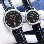 Longines quartz wristwatch pair with black dials and black leather straps, silver-tone cases