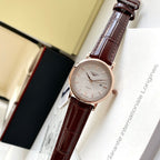 Longines wristwatch with brown leather strap and rose-toned case, white dial
