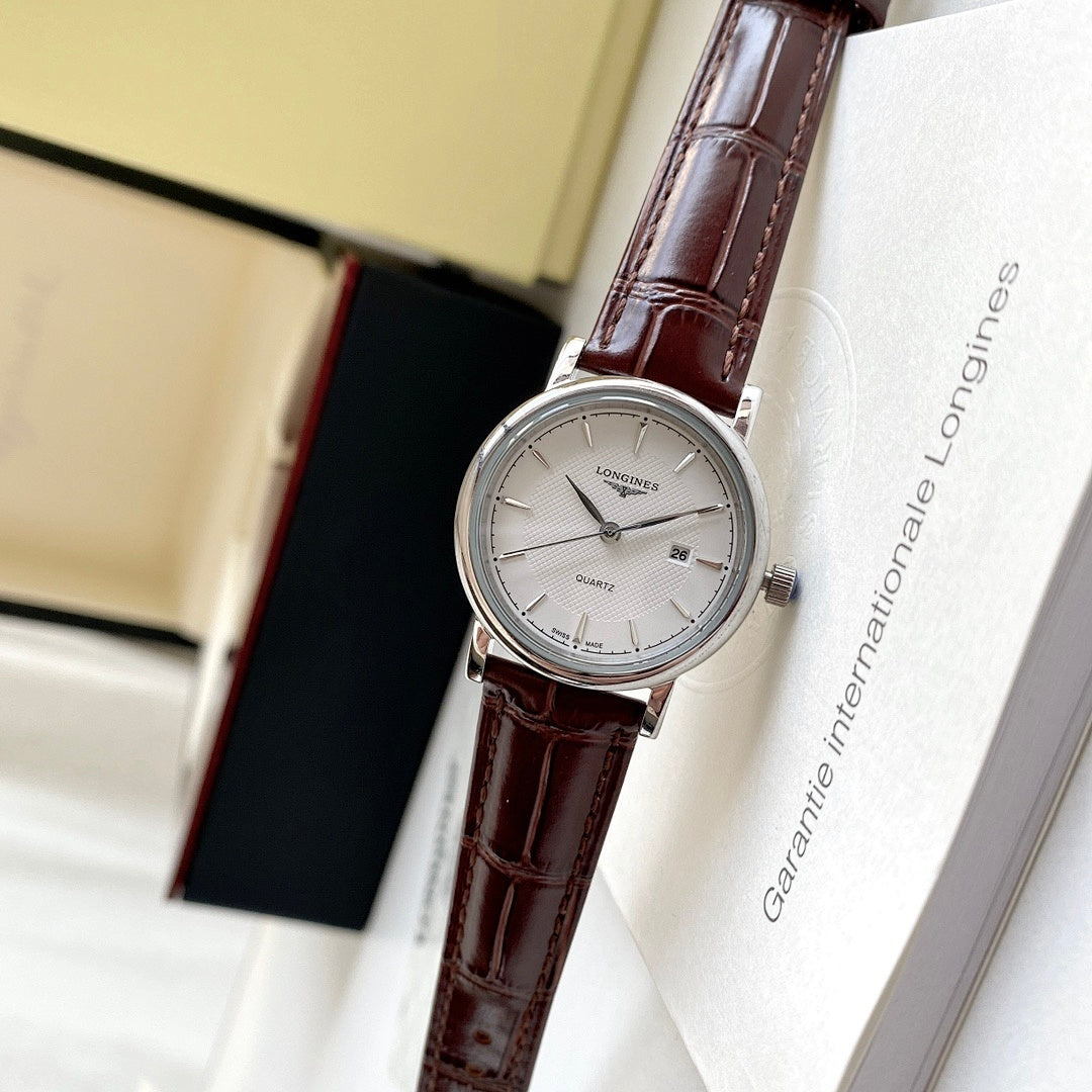 Longines wristwatch with brown leather strap and silver case, silver-white dial
