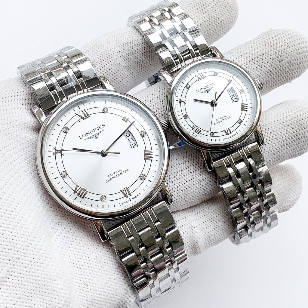 Longines watch with silver metal bracelet, white dial, Roman numerals and date window.