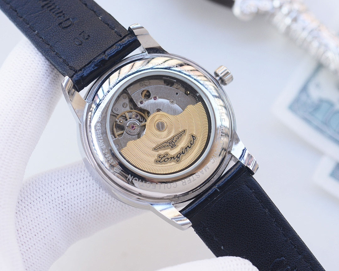 Longines watch caseback with exposed mechanical details and blue leather strap