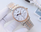 Longines wristwatch with silver mesh bracelet, white dial and rose-tone accents