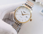Longines two-tone automatic wristwatch with white dial and gold bezel detail