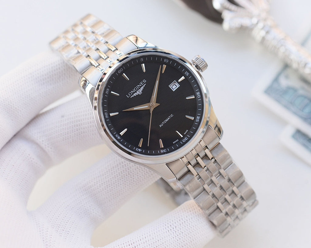 Longines two-tone automatic wristwatch with dark dial and baton hour markers
