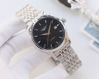 Longines two-tone automatic wristwatch with dark dial and baton hour markers