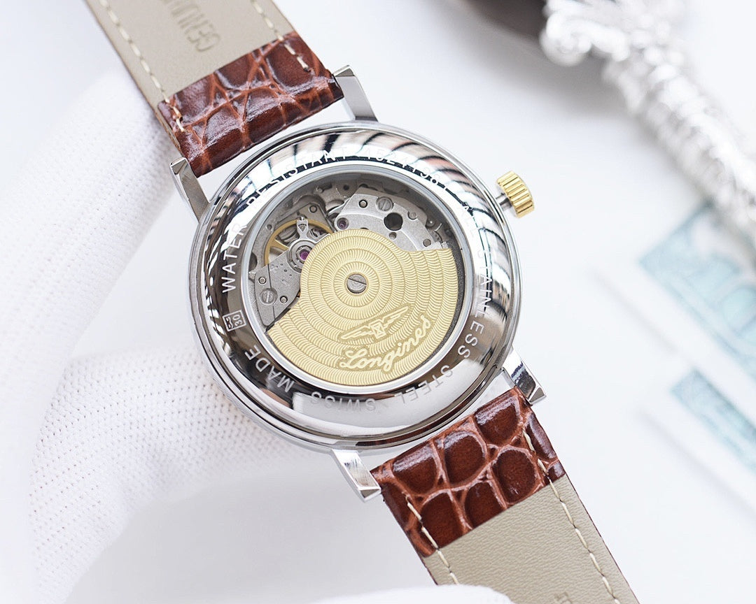 Longines automatic watch with open caseback and brown crocodile-style leather strap