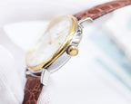 Longines watch with gold-tone crown and brown leather strap