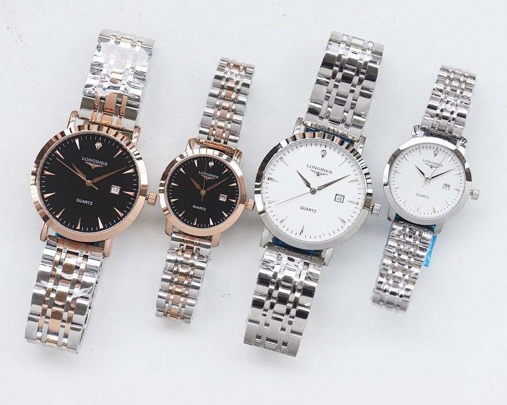 Set of four analog wristwatches with metal bracelets in dark and white dials