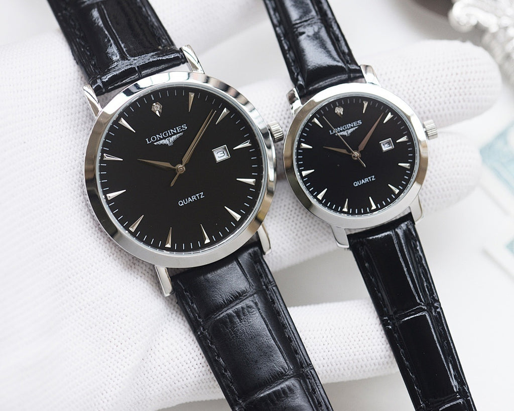 Analog wristwatch pair with black dials, silver cases, and black leather straps