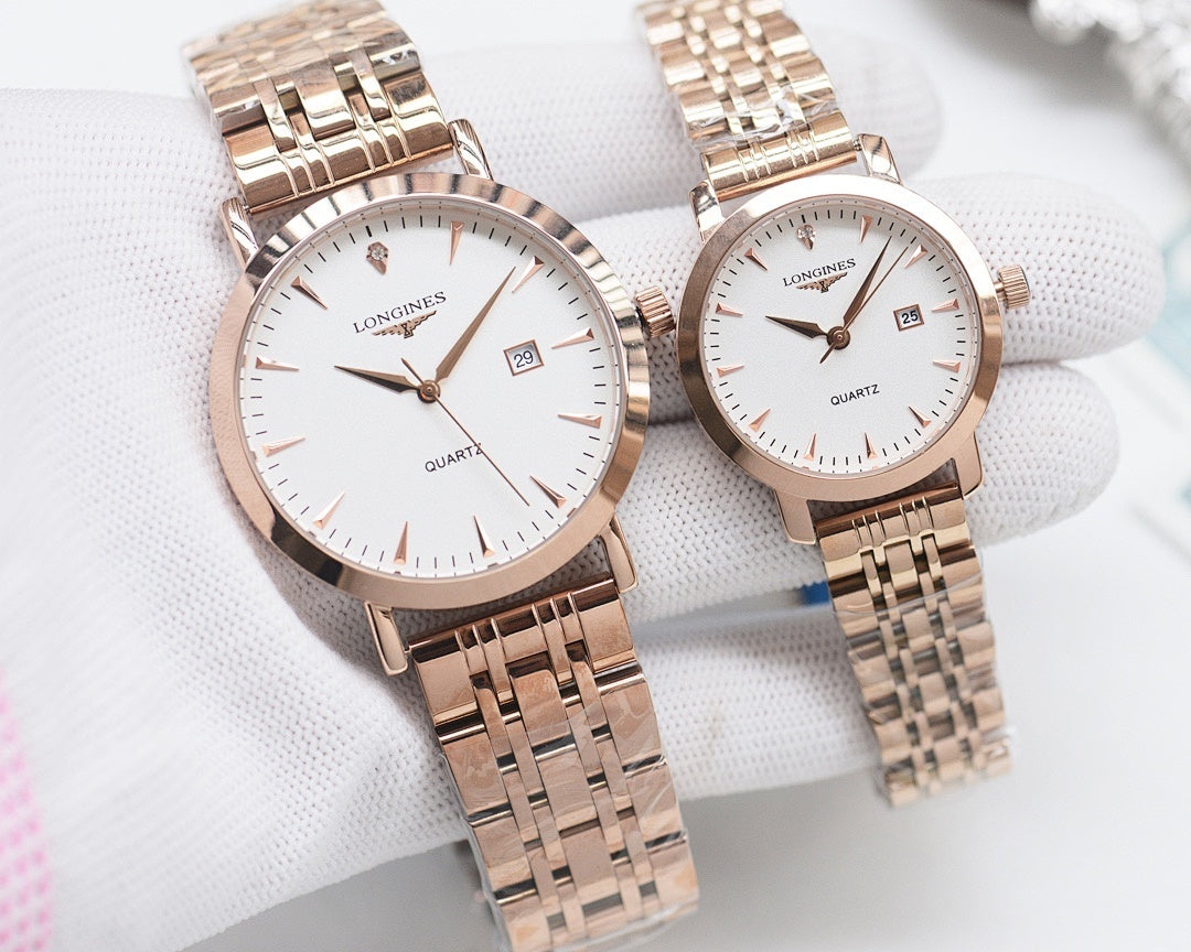 Rose-gold analog wristwatch pair with white dials and metal link bracelets