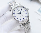 Longines automatic wristwatch with white dial and blue accents, steel link bracelet
