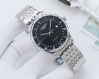 Longines wristwatch with two-tone metal bracelet and black dial, gold-toned hands