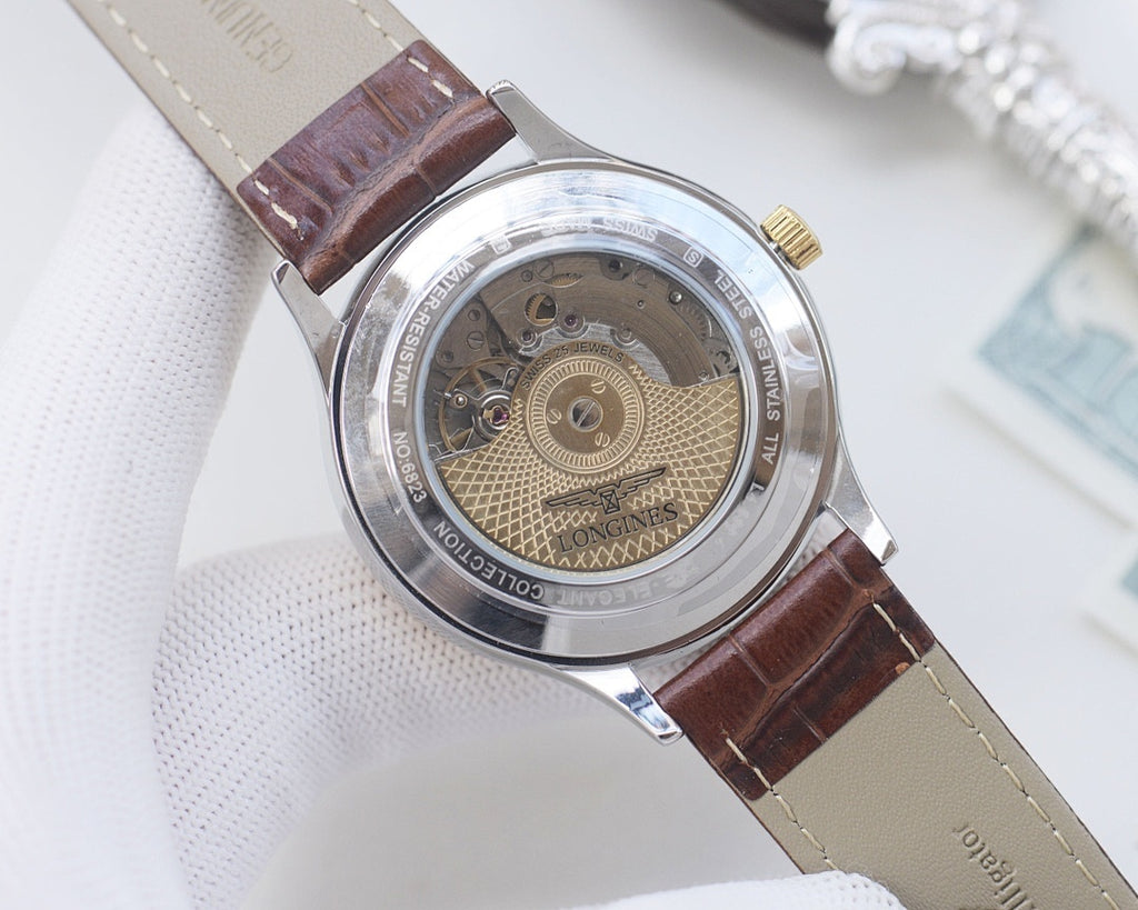 Longines wristwatch with brown leather strap and see-through case back detail