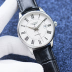Longines automatic wristwatch with silver bezel, white dial, black leather strap, date window