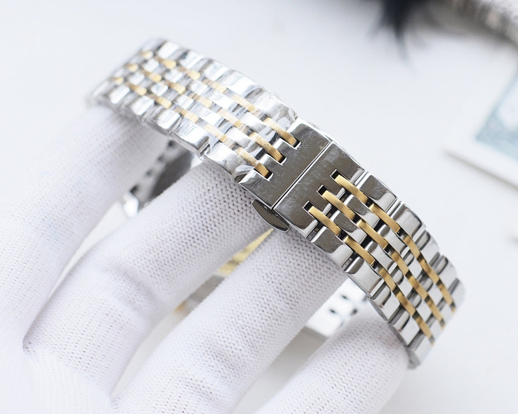 Two-tone Longines watch with metal clasp and gold-accent link bracelet