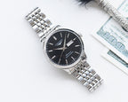 Longines watch with black dial and silver stainless steel bracelet
