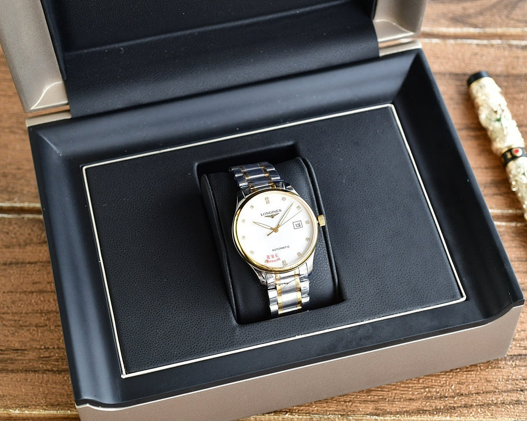 Longines watch in a presentation box with two-tone metal bracelet