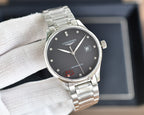 Longines watch with dark dial, silver-tone case, and two-tone metal bracelet