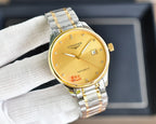 Longines watch with gold-tone dial, gold hands, and two-tone metal bracelet