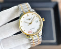 Longines watch with gold-tone bezel, white dial, and two-tone metal bracelet