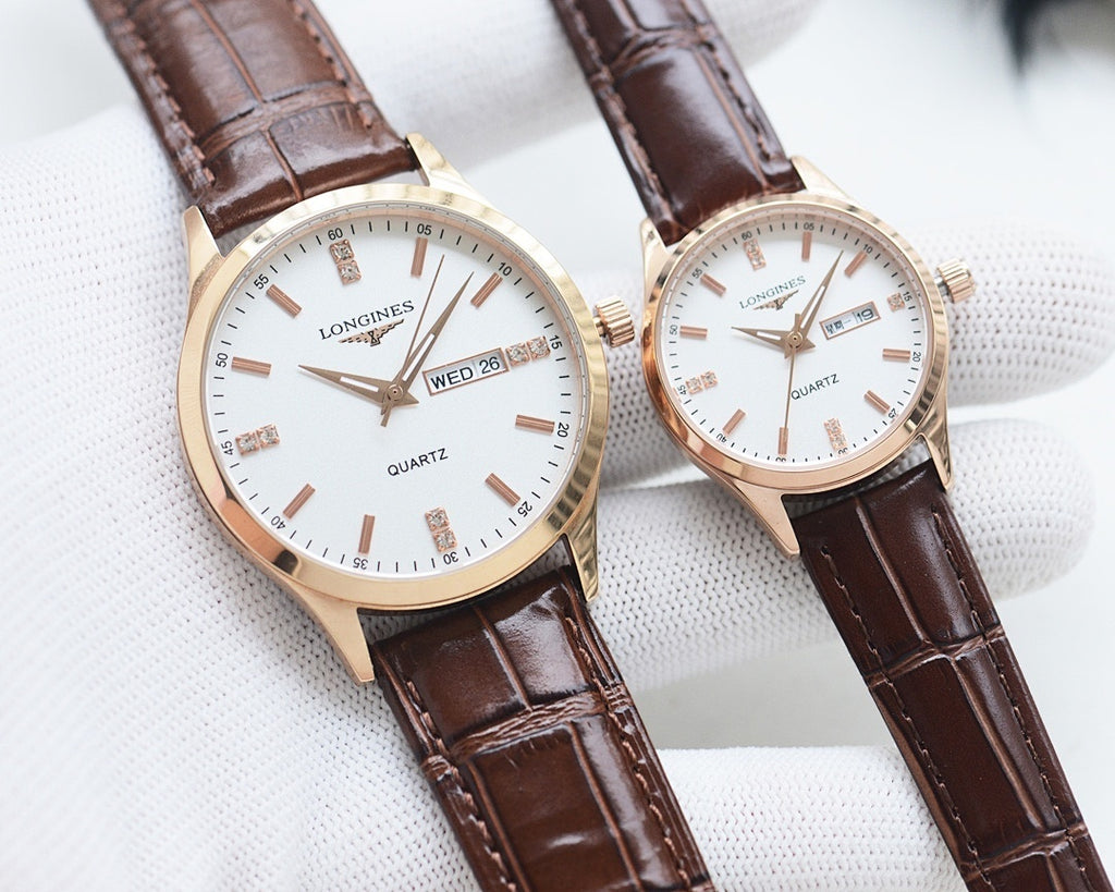 Longines quartz watch with rose gold-tone case, white dial, brown leather strap, Wed date
